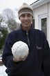 A Young Adult holding a snow ball