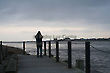 Man (Silhouete) in Sunset Looking Through Binoculus